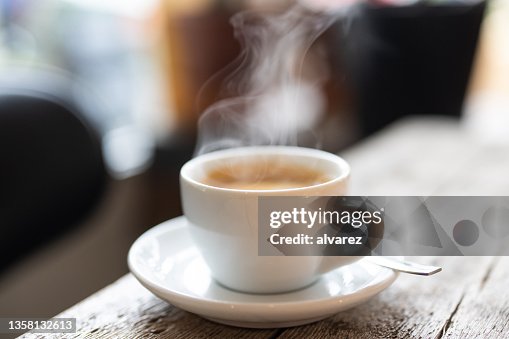 Refreshing hot cup of coffee at a cafe Refreshing hot cup of coffee at a cafe