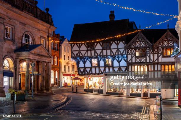 christmas lights, ludlow, shropshire, england - christmas decorations in store stock pictures, royalty-free photos & images