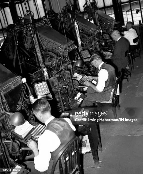 Brooklyn Eagle newspaper composing editors type the next day paper circa 1936 in Brooklyn, New York. The Brooklyn Eagle was a daily newspaper...