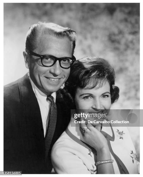 Actor, Emcee and Game Show Host Allen Ludden and his wife Actress Betty White in a publicity shot from the American game show 'Password' United...