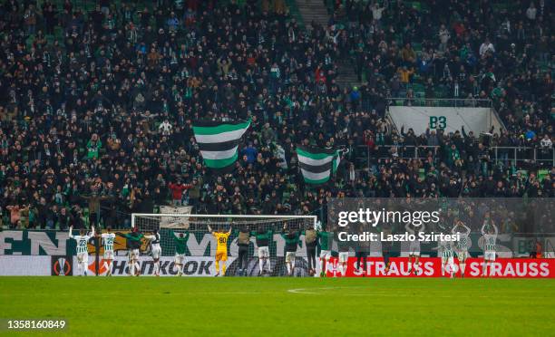 Teammates of Ferencvarosi TC celebrate in front of the fans after the UEFA Europa League group G match between Ferencvarosi TC and Bayer Leverkusen...