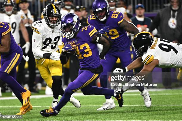 Dalvin Cook of the Minnesota Vikings carries the ball for a touchdown in the second quarter of the game against the Pittsburgh Steelers at U.S. Bank...