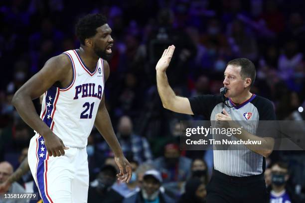 Joel Embiid of the Philadelphia 76ers speaks to referee Brent Barnaky during the fourth quarter og a game between the Philadelphia 76ers and Utah...