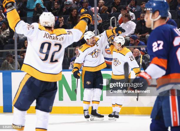 Roman Josi of the Nashville Predators scores the game-winning goal at 19:48 of the third period against the New York Islanders and is joined by Eeli...