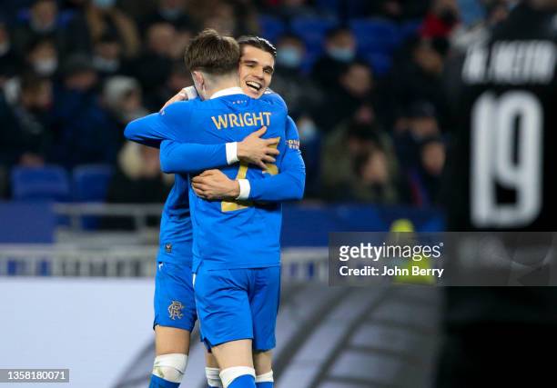 Scott Wright of Glasgow Rangers celebrates his goal with Ianis Hagi during the UEFA Europa League group A match between Olympique Lyonnais and...