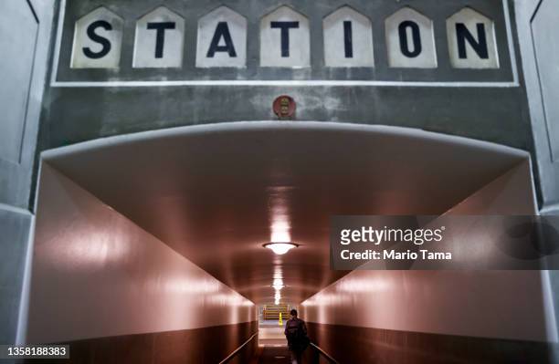 Passenger departs from an Amtrak train at Union Station on December 9, 2021 in Los Angeles, California. Amtrak is having difficulty hiring and...
