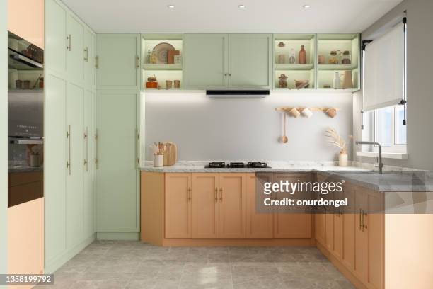 modernes kücheninterieur mit pastellfarbenen schränken - kitchen stock-fotos und bilder