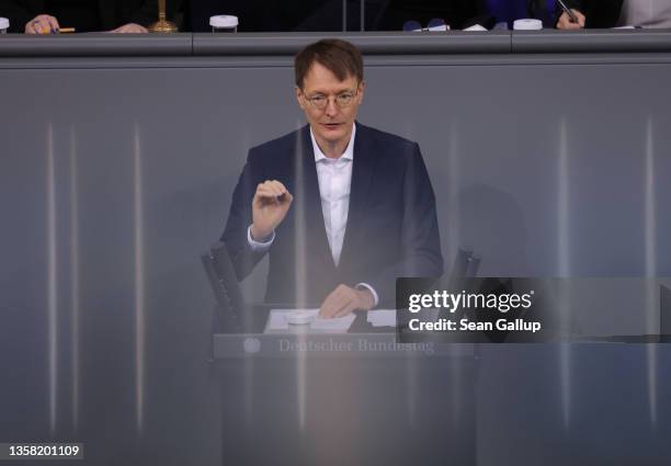 German Health Minister Karl Lauterbach speaks at the Bundestag during debates prior to a vote on a new legislation that would mandate Covid-19...