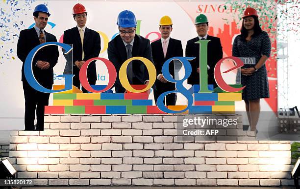 Julian Persaud , managing director of Google Southeast Asia, completes the Google letters on stage at a press conference on December 15, 2011. The...