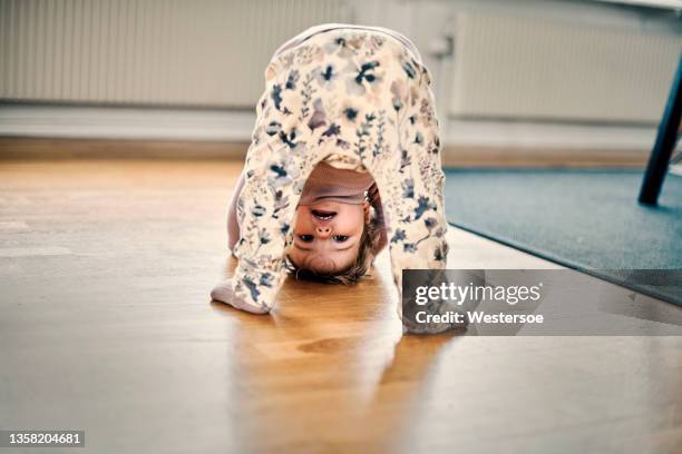 girl playing on floor - baby play stock pictures, royalty-free photos & images