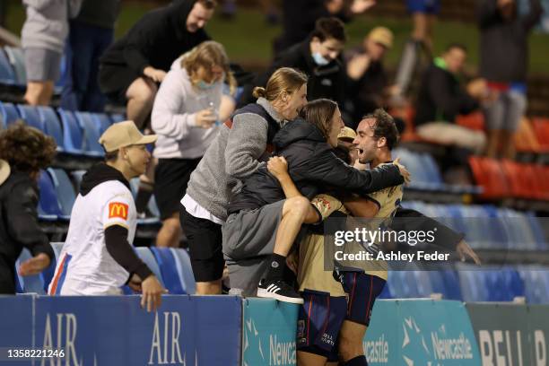 Dylan Murnane of the Jets celebrates his goal with team mates and fans during the A-League Mens match between Newcastle Jets and Wellington Phoenix...