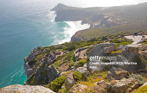 tourists at the vantage point, cape point, cape of good hope, table mountain national park, cape peninsula, western cape, south africa - cape point stock pictures, royalty-free photos & images