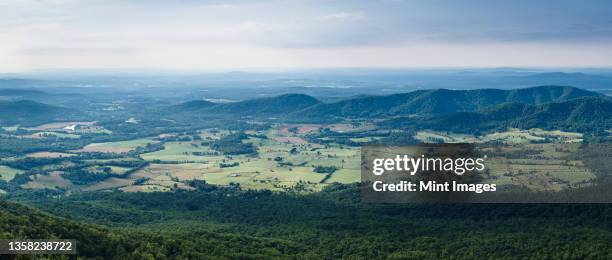 shenandoah valley vista, elevated view over rolling countryside, fields and farms in virginia. - shenandoah valley stock pictures, royalty-free photos & images