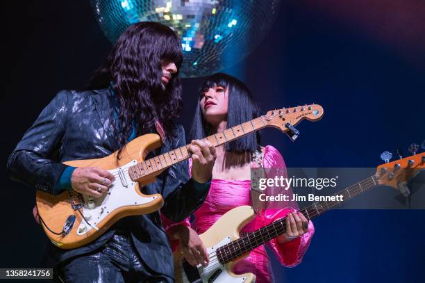 Guitarist Mark Speer and bassist Laura Lee of Khruangbin performs live on stage at Royal Oak Music Theatre on December 09, 2021 in Royal Oak,...