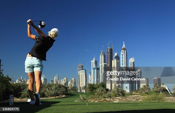 Melissa Reid of England tees off at the par 4, 8th hole during the second round of the 2011 Omega Dubai Ladies Masters on the Majilis Course at the...