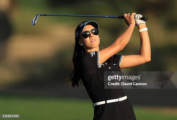 Maria Verchenova of Russia plays her third shot on the par 5, 10th hole during the second round of the 2011 Omega Dubai Ladies Masters on the Majilis...