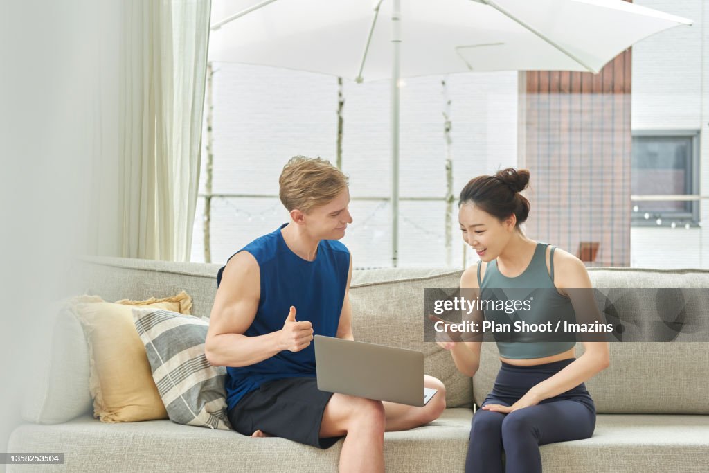 Learn Excercise A Woman Learning Exercise From A Man High-Res Stock Photo - Getty Images