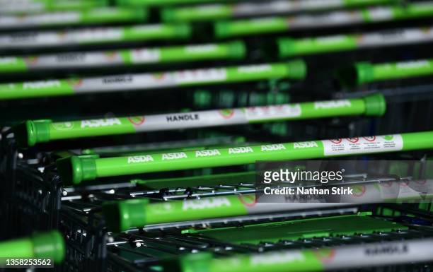 General view of shopping trolleys outside an Asda Supermarket Store at Wolstanton Retail Park on December 10, 2021 in Stoke on Trent, England.