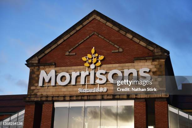 Logo of Supermarket company, Morrisons outside one of its stores on December 10, 2021 in Stoke on Trent, England.