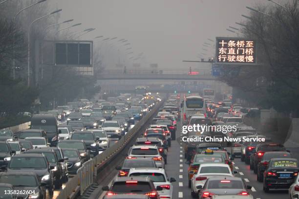 Vehicles clog a road during the morning rush hour on December 9, 2021 in Beijing, China.