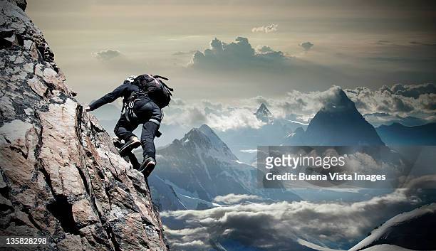 climber on the mount rosa massif - back shot position stock pictures, royalty-free photos & images