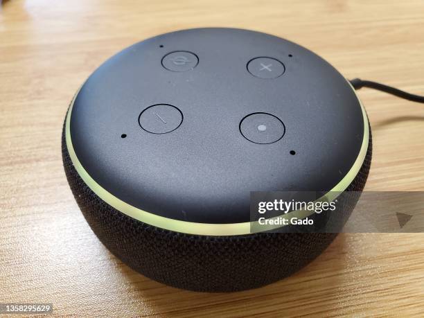 Amazon Echo Dot third generation smart speaker on light wooden background, Lafayette, California, December 4, 2021. Photo courtesy Tech Trends.