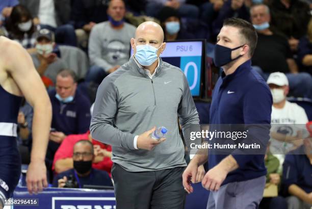Head coach Cael Sanderson of the Penn State Nittany Lions coaches during a match against the Penn Quakers at The Palestra on the campus of the...