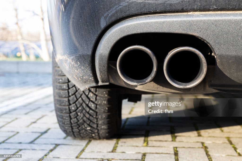 Exhaust pipe at a car (Berlin, Germany)