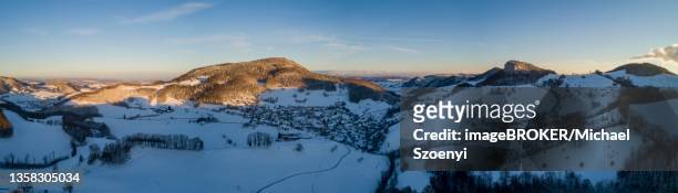 wisner flueh and village view of wisen, aerial view in winter, solothurn, switzerland - solothurn stockfoto's en -beelden