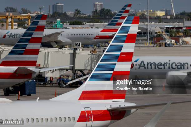 American Airlines planes parked at their gates in the Miami International Airport on December 10, 2021 in Miami, Florida. The American Airlines...