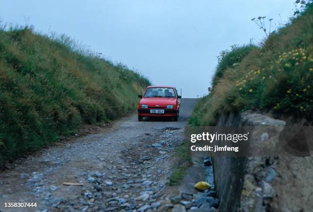 old retro vintage style positive film scan, the road to castle house farm, ballymacoda, county cork, ireland - blarney castle stock pictures, royalty-free photos & images