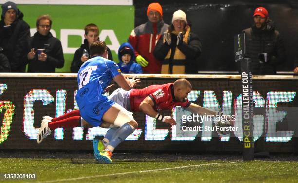 Falcons player Mike Brown dives into the corner to score the second try during the EPCR Challenge Cup match between Newcastle Falcons and Worcester...
