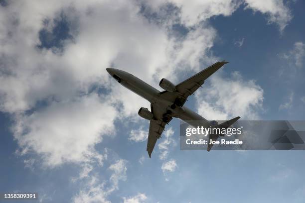 An American Airlines Boeing 787-9 Dreamliner approaches for a landing at the Miami International Airport on December 10, 2021 in Miami, Florida. The...