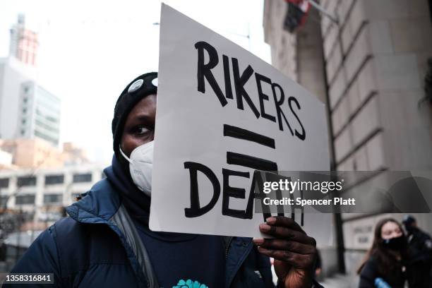 Activists calling for jail and prison reforms rally outside of Brooklyn Criminal Court on December 10, 2021 in New York City. The group, which...