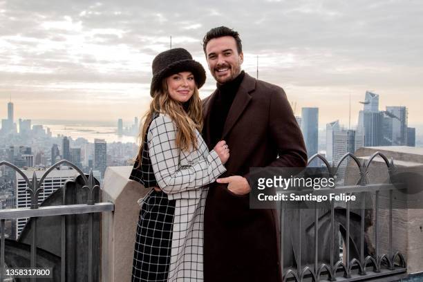 Hannah Brown and Adam Woolard visit 'Top of The Rock' at Rockefeller Center on December 10, 2021 in New York City.