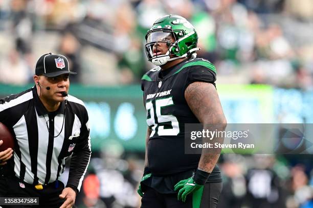 Quinnen Williams of the New York Jets looks on against the Philadelphia Eagles at MetLife Stadium on December 05, 2021 in East Rutherford, New Jersey.