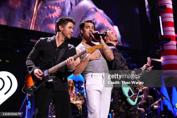 Nick Jonas, Joe Jonas and Kevin Jonas of the Jonas Brothers perform onstage during iHeartRadio Z100 Jingle Ball 2021 on December 10, 2021 in New York...
