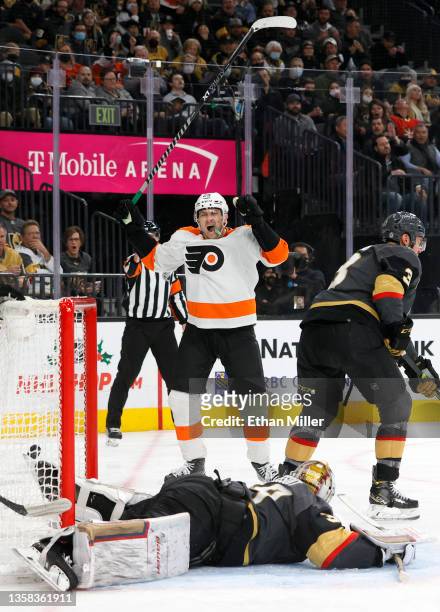 James van Riemsdyk of the Philadelphia Flyers celebrates his third-period power-play goal against Laurent Brossoit of the Vegas Golden Knights during...
