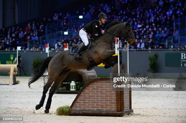 Robin Godel from Switzerland, riding Grandeur de Lully CH during Cross Indoor Rolex CHI Geneva on December 10, 2021 in Geneva, Switzerland.