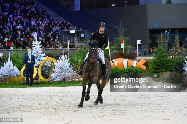 Robin Godel from Switzerland, riding Grandeur de Lully CH during Cross Indoor Rolex CHI Geneva on December 10, 2021 in Geneva, Switzerland.