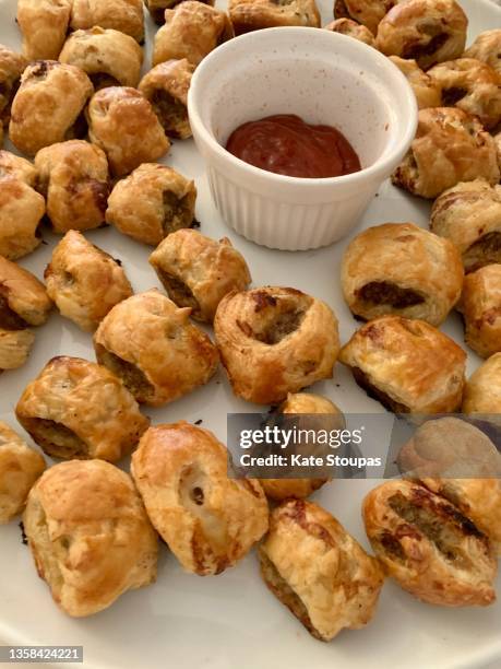 holiday party food - sausage roll stock pictures, royalty-free photos & images