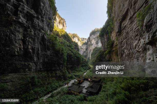 temple in a valley of wulong national park in chongqing, china - chongqing municipality stock pictures, royalty-free photos & images