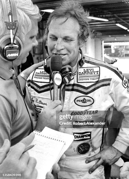 Driver Joe Ruttman is interviewed by MRN after competing in the 1983 Daytona 500 stock car race at Daytona International Speedway in Daytona Beach,...