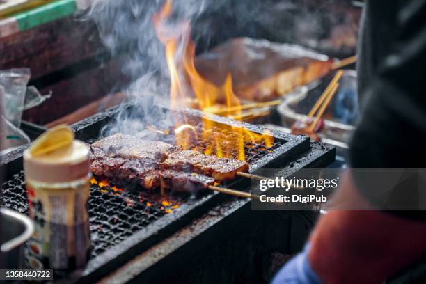 meat skewers - outdoor concession stand stock pictures, royalty-free photos & images