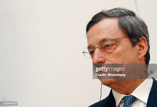 Mario Draghi, president of the European Central Bank , listens during the 'Ludwig Erhard Lecture' event in Berlin, Germany, on Thursday, Dec. 15,...