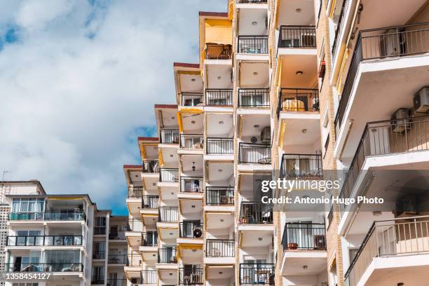 set of square-shaped balconies in a residential building. typical spanish coastal buildings. - apartment tour stock pictures, royalty-free photos & images