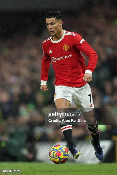 Cristiano Ronaldo of Manchester United runs with the ball during the Premier League match between Norwich City and Manchester United at Carrow Road...