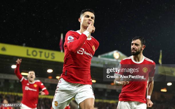 Cristiano Ronaldo of Manchester United celebrates after scoring their side's first goal during the Premier League match between Norwich City and...