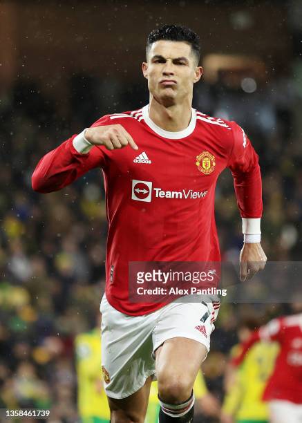 Cristiano Ronaldo of Manchester United celebrates after scoring their side's first goal during the Premier League match between Norwich City and...