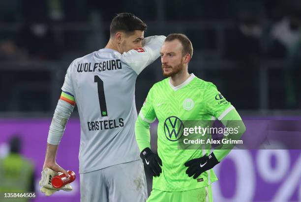 Koen Casteels and Maximilian Arnold of Wolfsburg look totally dejected after the Bundesliga match between VfL Wolfsburg and VfB Stuttgart at...